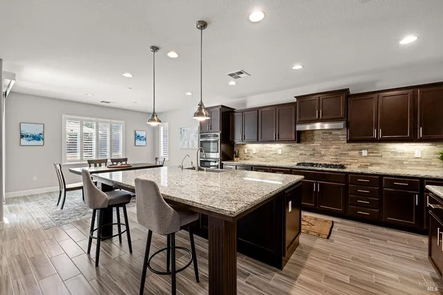 a view of a workspace with furniture
