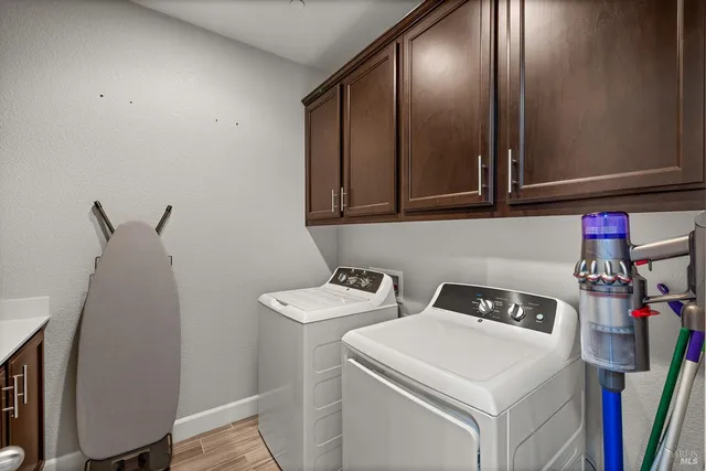 a spacious bathroom with a sink double vanity and a shower