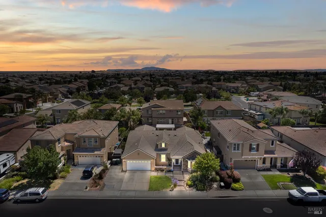 a lobby with furniture and floor to ceiling window
