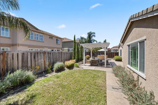 an aerial view of a house with a garden