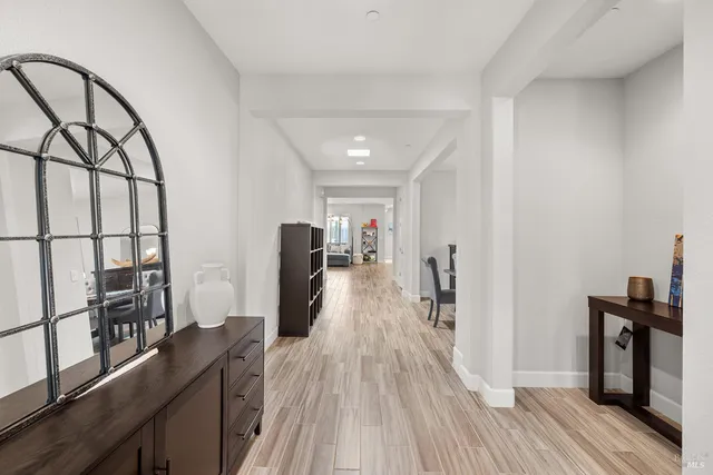 a bathroom with a sink vanity and a mirror