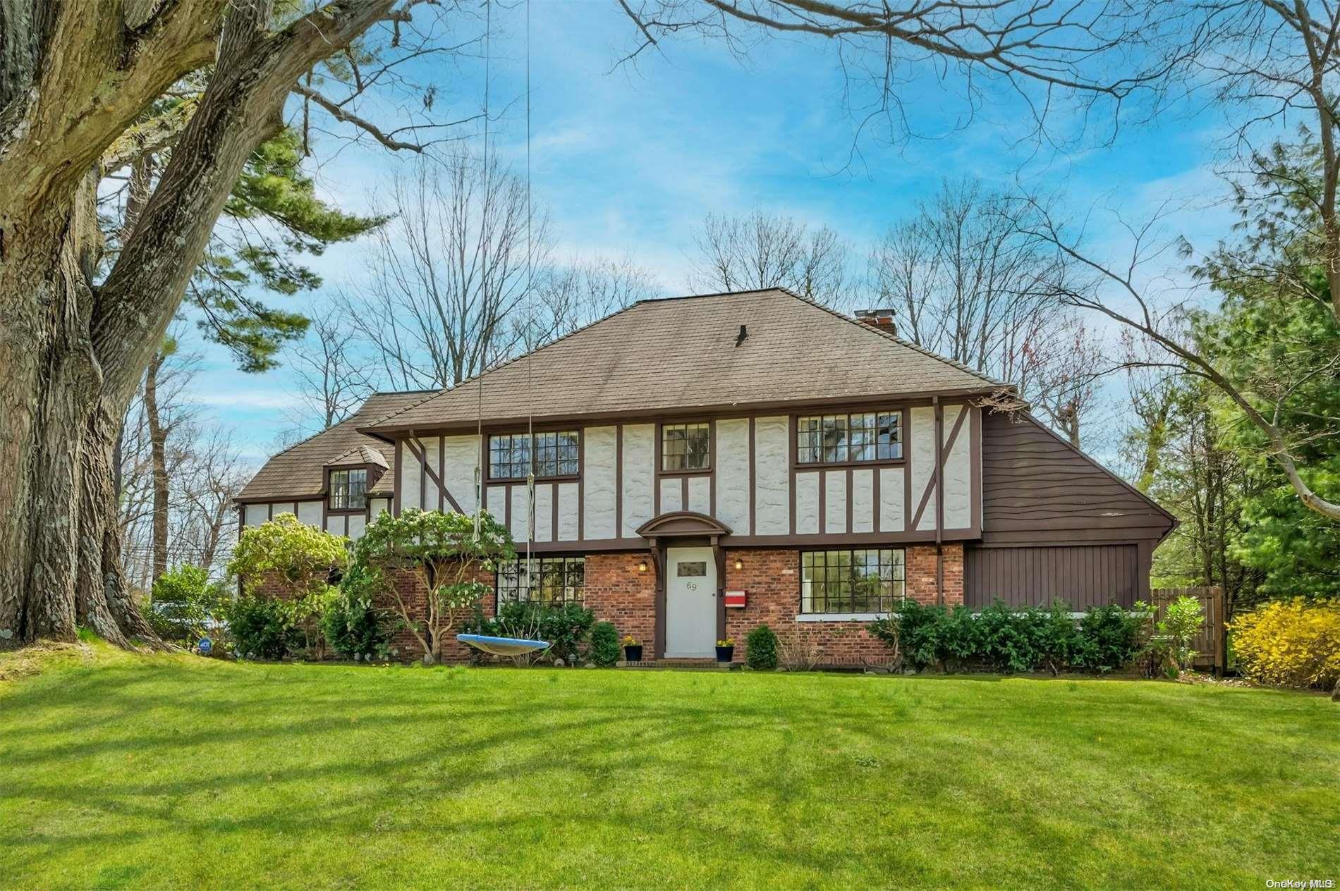 69 Summit Road Port Washington, NY 11050 - Photo 1 of 1 a view of a house with a yard