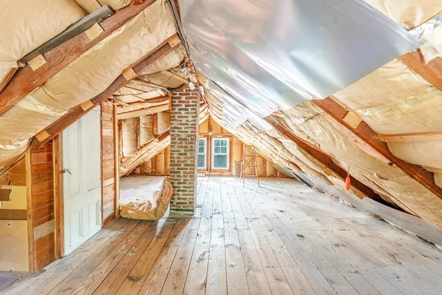 a view of a house with a roof deck
