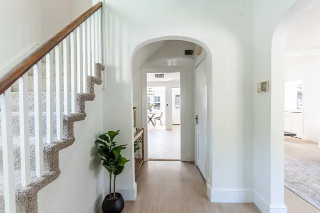 a view of entryway with wooden floor