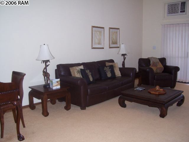 100 Ridge Road, Unit 1721 Lahaina, HI 96761 - Photo 9 of 17 a living room with furniture