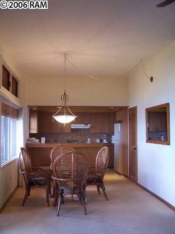 100 Ridge Road, Unit 1721 Lahaina, HI 96761 - Photo 10 of 17 a view of a dining room with furniture