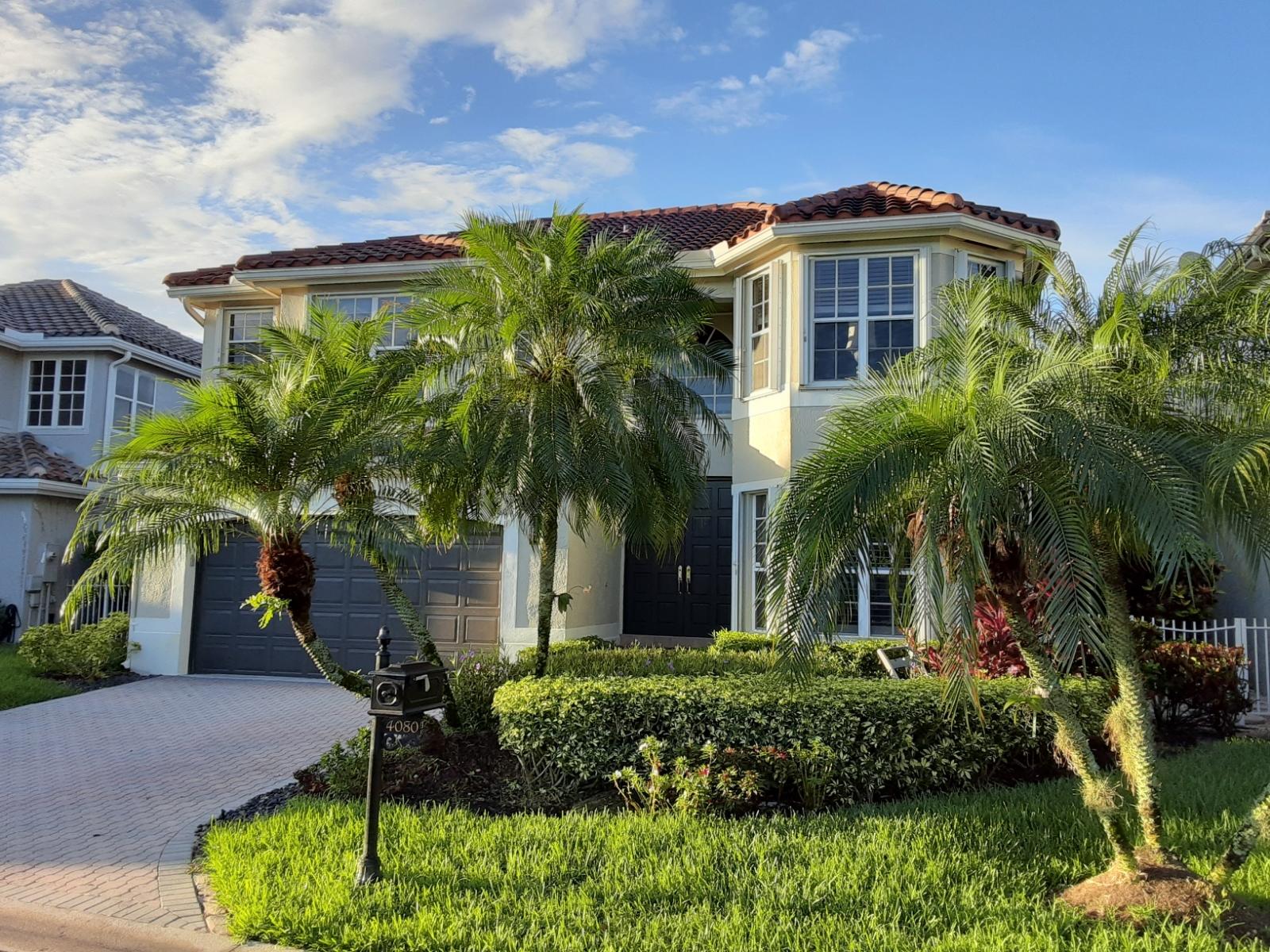 4080 Northwest 58th Lane Boca Raton, FL 33496 - Photo 1 of 20 Front