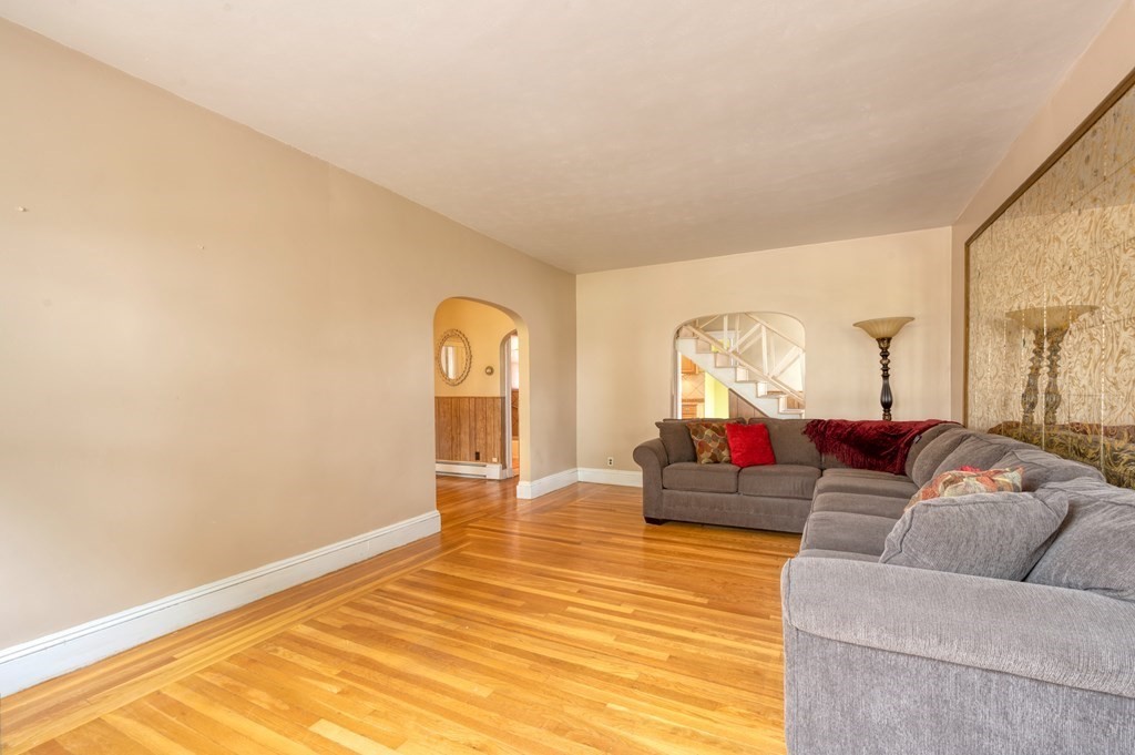 43 Ormond Street Boston, MA 02126 - Photo 13 of 30 a living room with furniture and a large window
