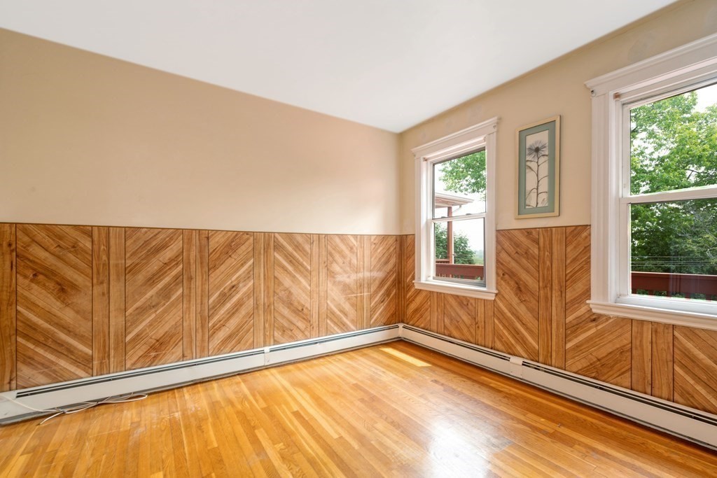 43 Ormond Street Boston, MA 02126 - Photo 15 of 30 a view of an empty room and wooden floor
