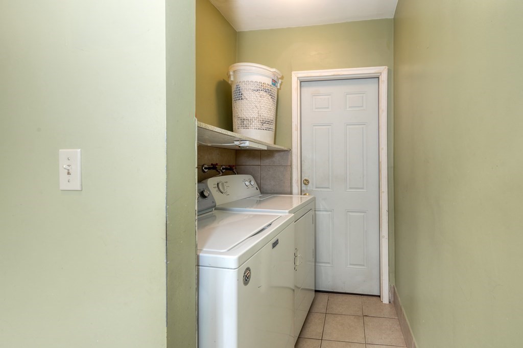 43 Ormond Street Boston, MA 02126 - Photo 18 of 30 a bathroom with a sink and a mirror