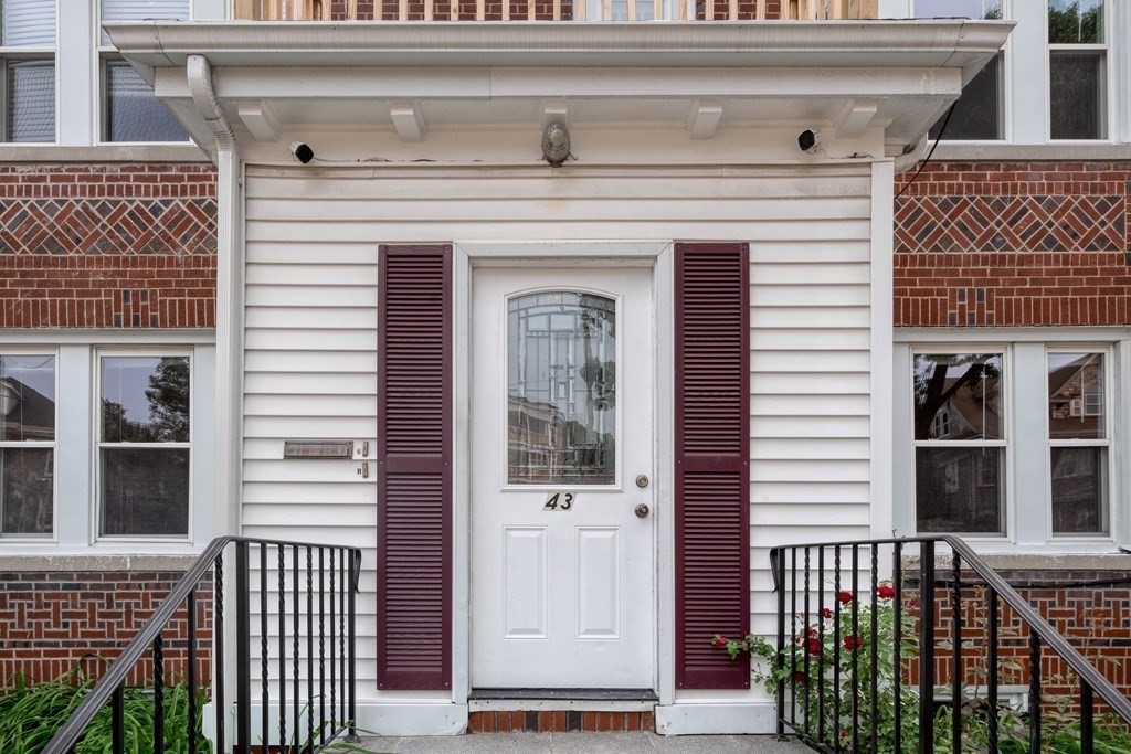 43 Ormond Street Boston, MA 02126 - Photo 27 of 30 front view of a house with a door