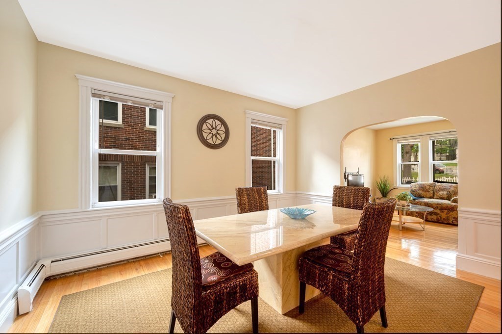 43 Ormond Street Boston, MA 02126 - Photo 3 of 30 a view of a dining room with furniture and window