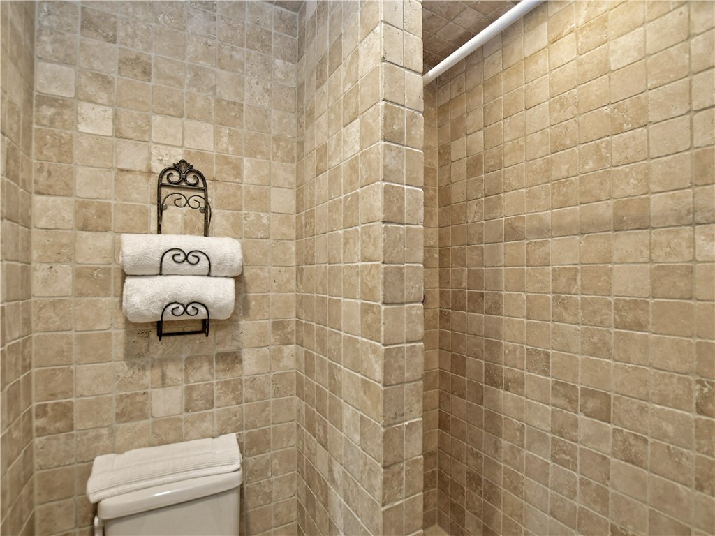 120 World Of Tennis Square, Unit 118C Lakeway, TX 78738 - Photo 17 of 29 a bathroom with a shower