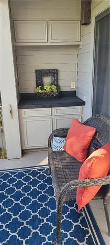 a kitchen with a stove and a cabinet