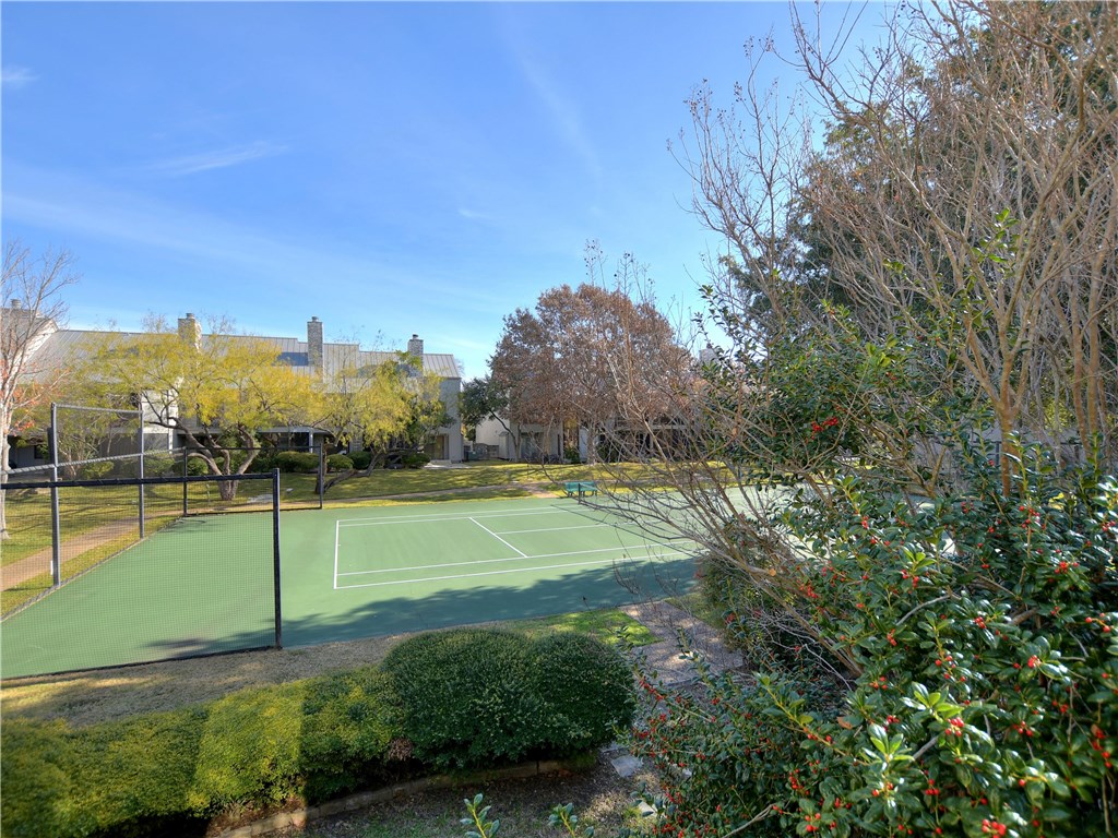 120 World Of Tennis Square, Unit 118C Lakeway, TX 78738 - Photo 25 of 29 a view of a golf course with a big yard