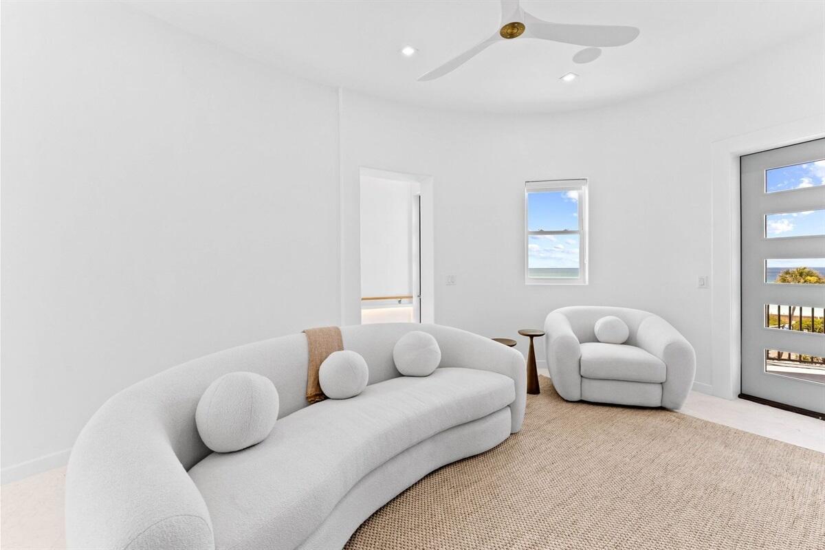 3434 East County Highway 30A Santa Rosa Beach, FL 32459 - Photo 29 of 58 a bedroom with furniture and a couch