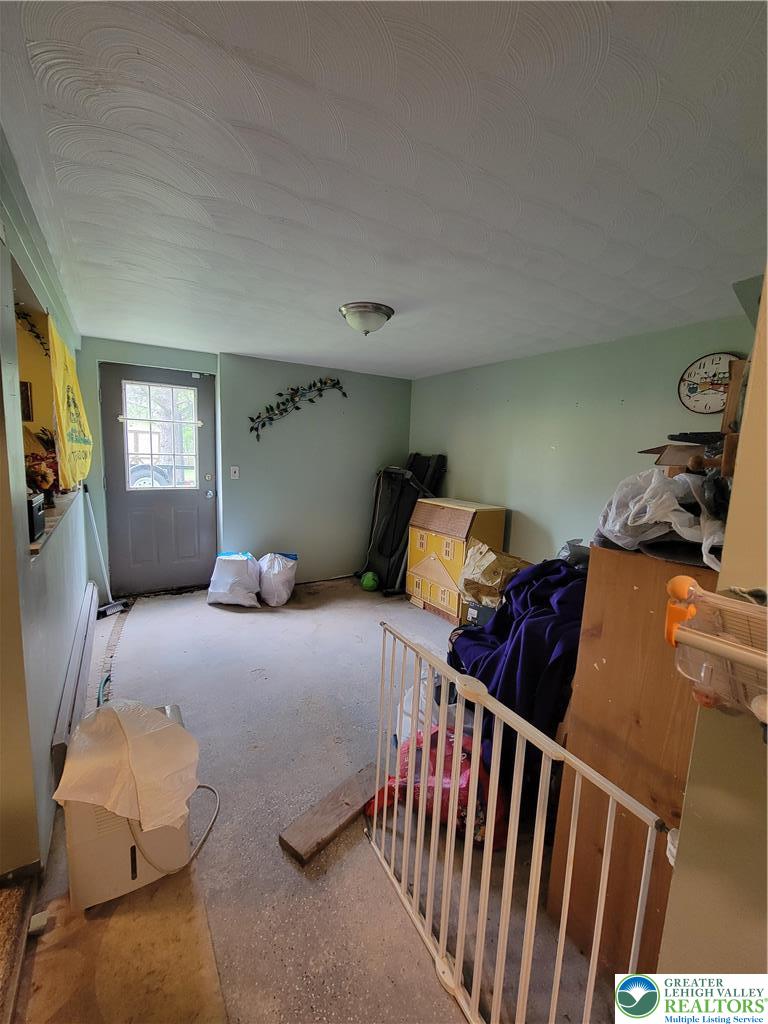 320 Hillside Street Forest City, PA 18421 - Photo 16 of 24 a bedroom with bed and a window