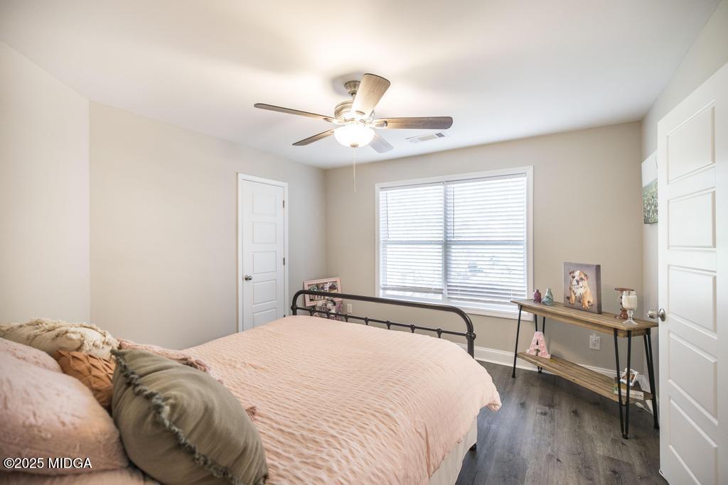 219 Diamond Place Gray, GA 31032 - Photo 36 of 42 a bedroom with a bed and a window