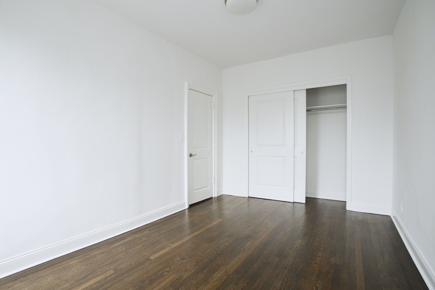 80 Winthrop Street, Unit U3 Brooklyn, NY 11225 - Photo 6 of 8 a view of an empty room with wooden floor and closet