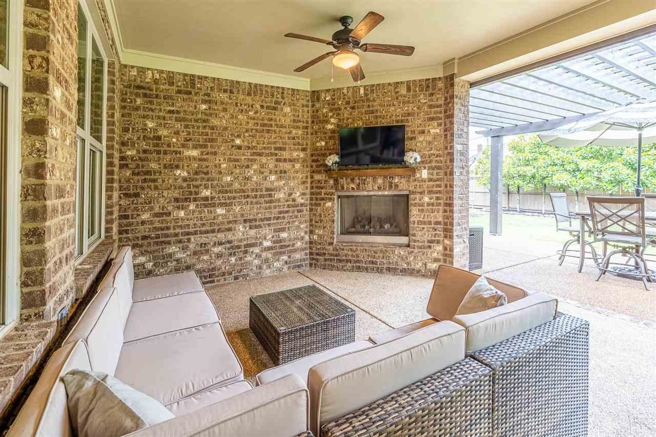 1357 Carmony Street Collierville, TN 38017 - Photo 13 of 16 View of patio / terrace with a pergola, ceiling fan, and an outdoor living space with a fireplace