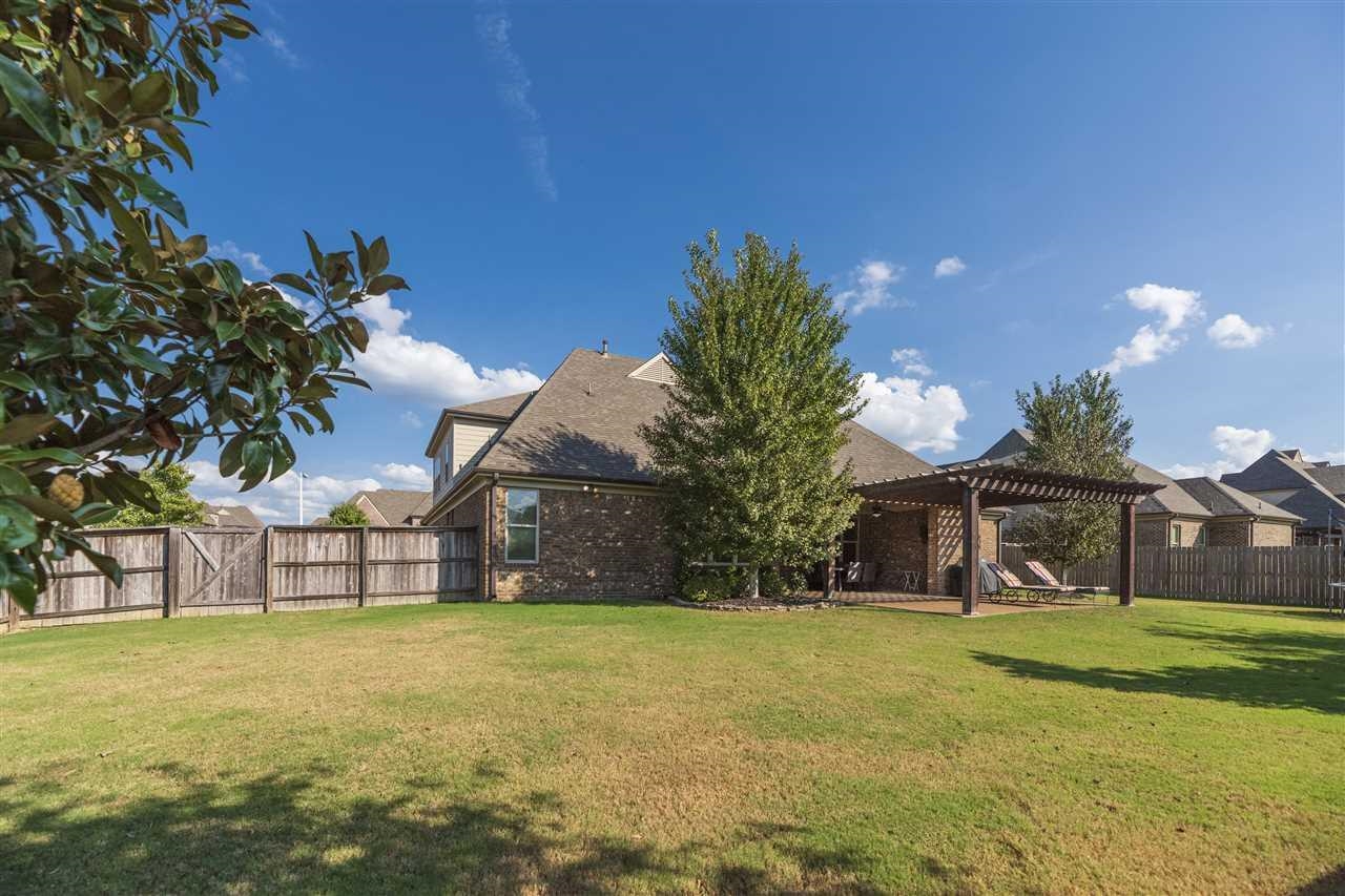 1357 Carmony Street Collierville, TN 38017 - Photo 15 of 16 Fenced backyard featuring a pergola