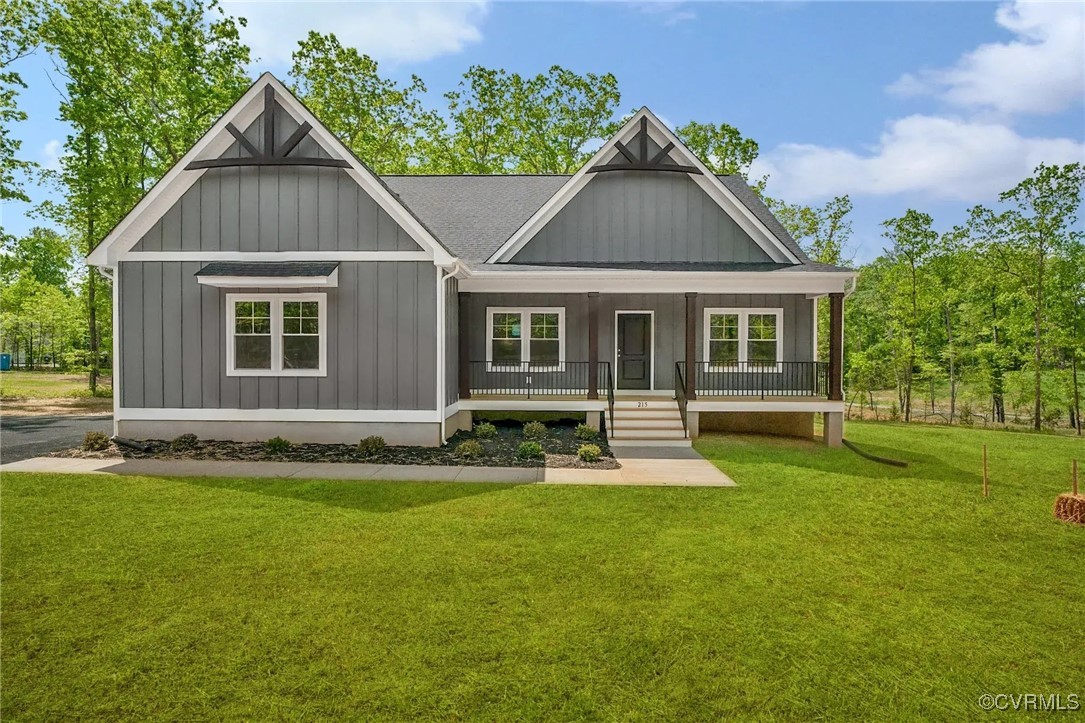 1367 Meadow Grove Drive Powhatan, VA 23139 - Photo 1 of 20 a front view of a house with a yard