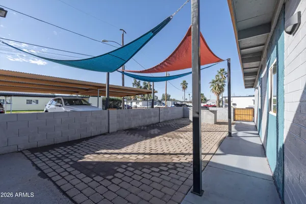 a room with lots of table and chairs