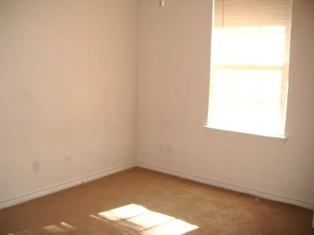 a view of a small space with a window