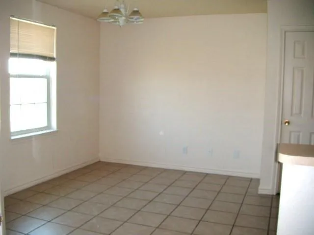 an empty room with a door