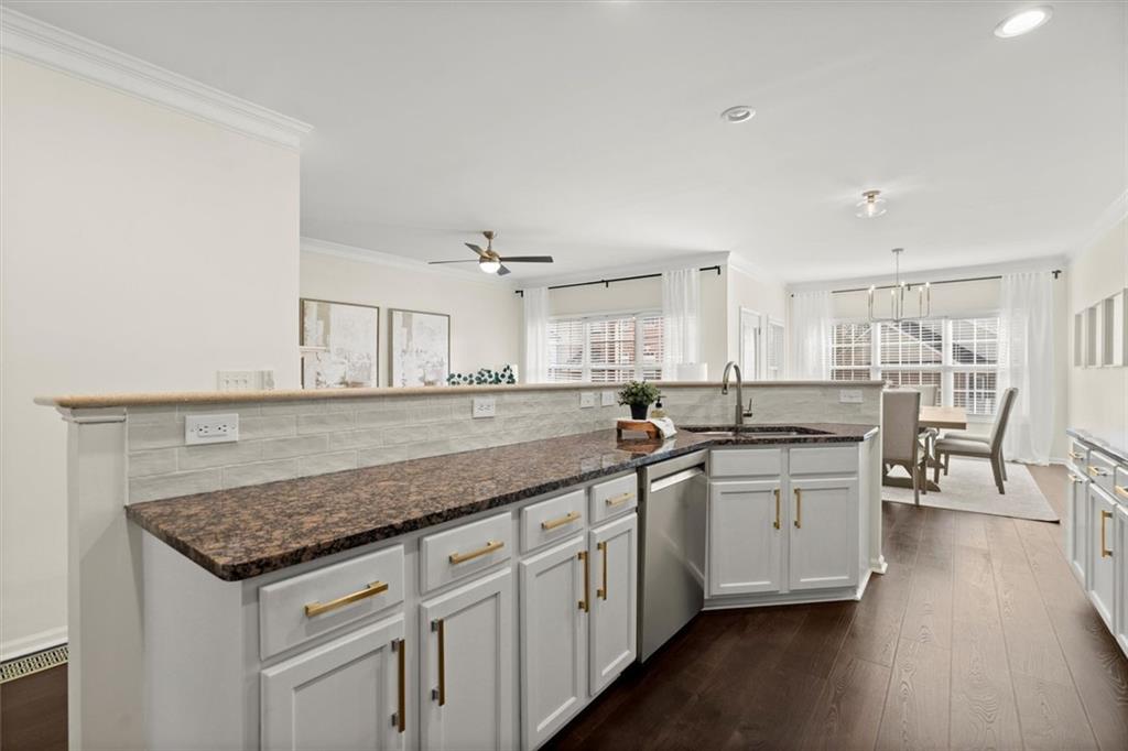 3196 Buck Way Alpharetta, GA 30004 - Photo 14 of 53 a kitchen with a sink and cabinets