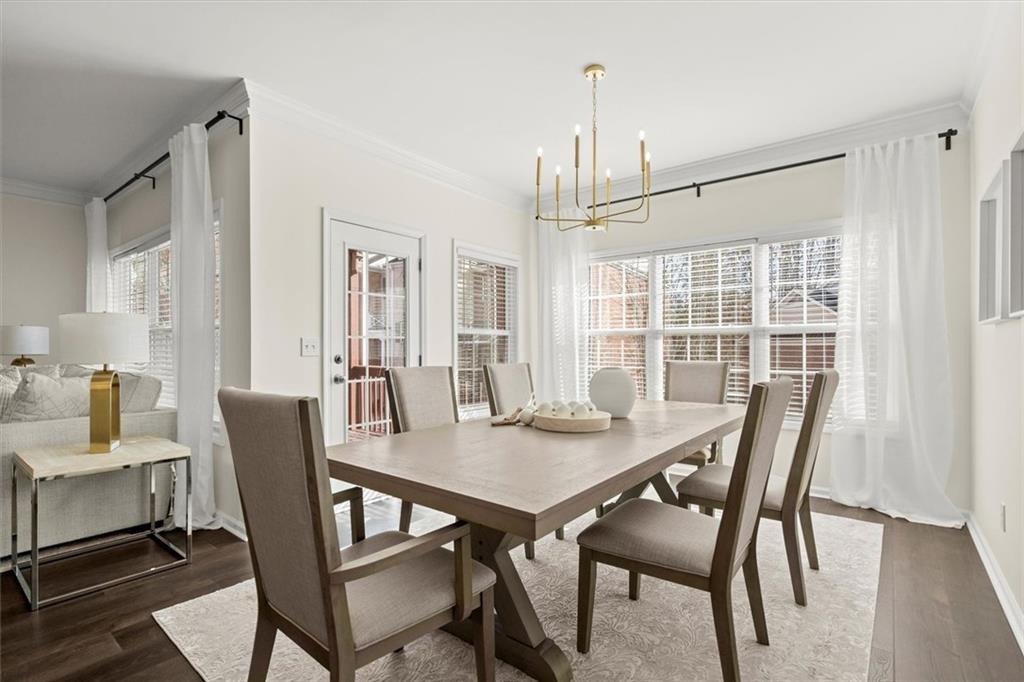 3196 Buck Way Alpharetta, GA 30004 - Photo 24 of 53 a view of a dining room with furniture window and wooden floor