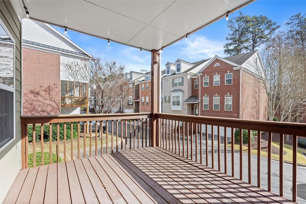 3196 Buck Way Alpharetta, GA 30004 - Photo 25 of 53 a view of a brick house with large windows