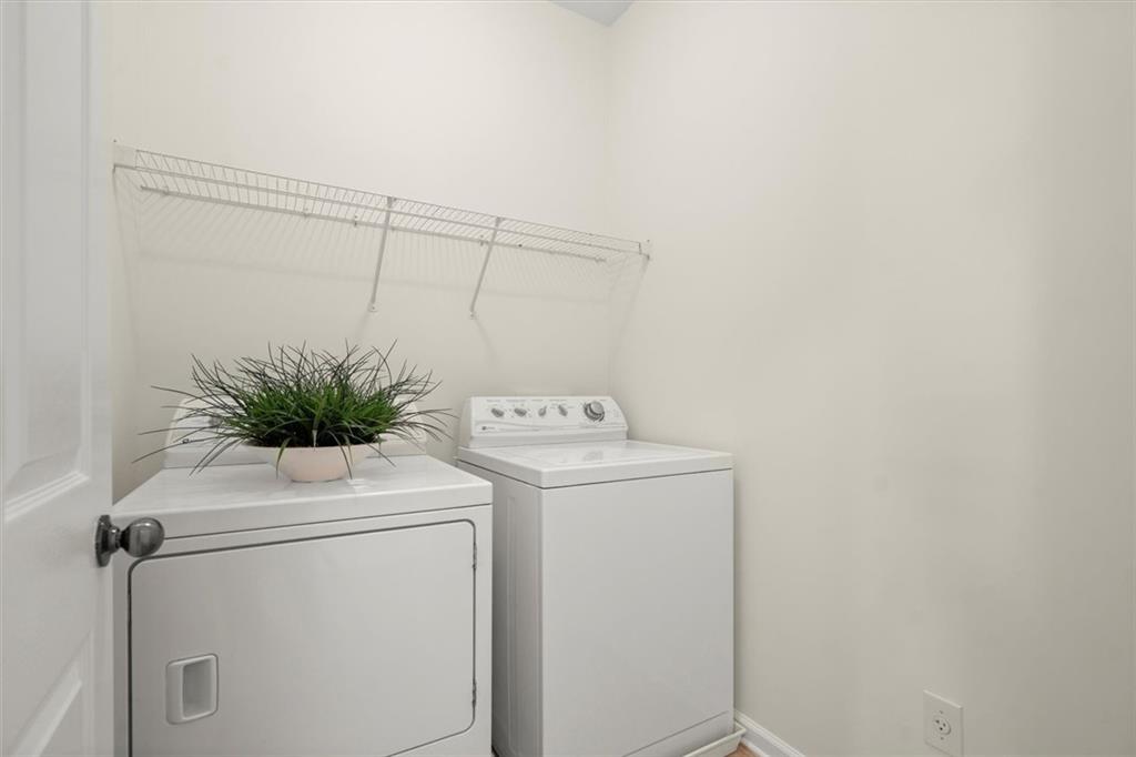 3196 Buck Way Alpharetta, GA 30004 - Photo 32 of 53 a utility room with dryer and washer