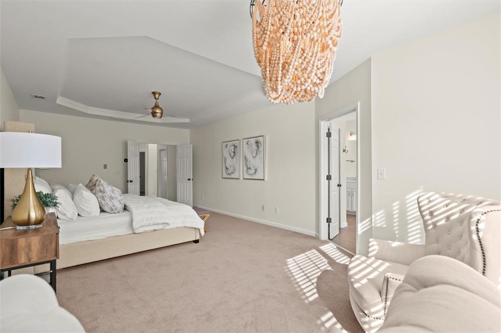 3196 Buck Way Alpharetta, GA 30004 - Photo 35 of 53 a living room with furniture and a chandelier