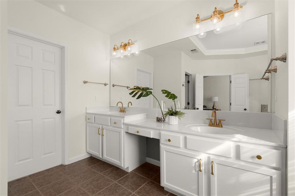 3196 Buck Way Alpharetta, GA 30004 - Photo 38 of 53 a bathroom with a double vanity sink mirror and