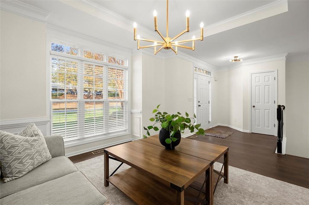3196 Buck Way Alpharetta, GA 30004 - Photo 7 of 53 a living room with furniture and a large window
