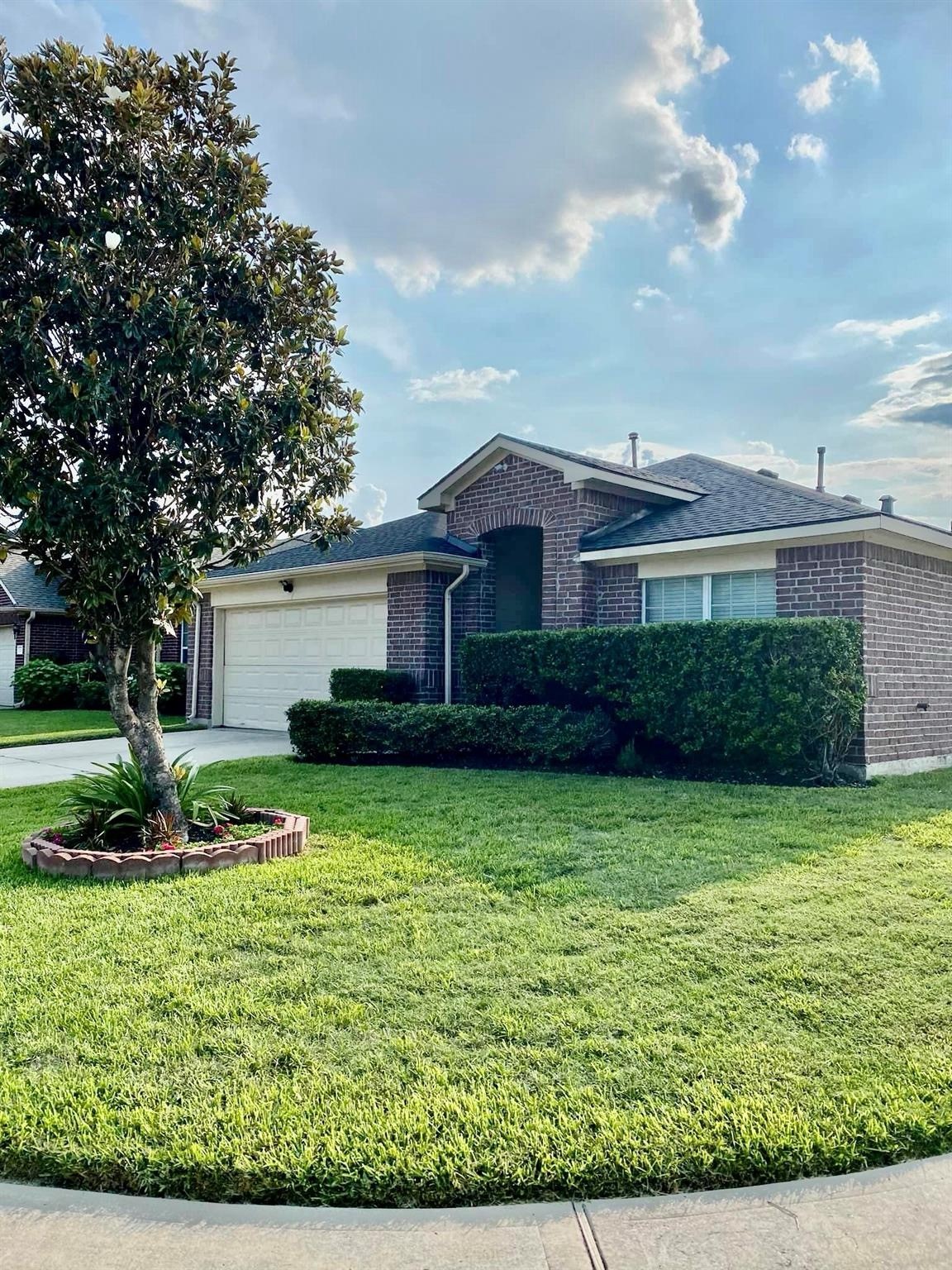 21127 Gate View Drive Houston, TX 77073 - Photo 5 of 18 a front view of a house with garden