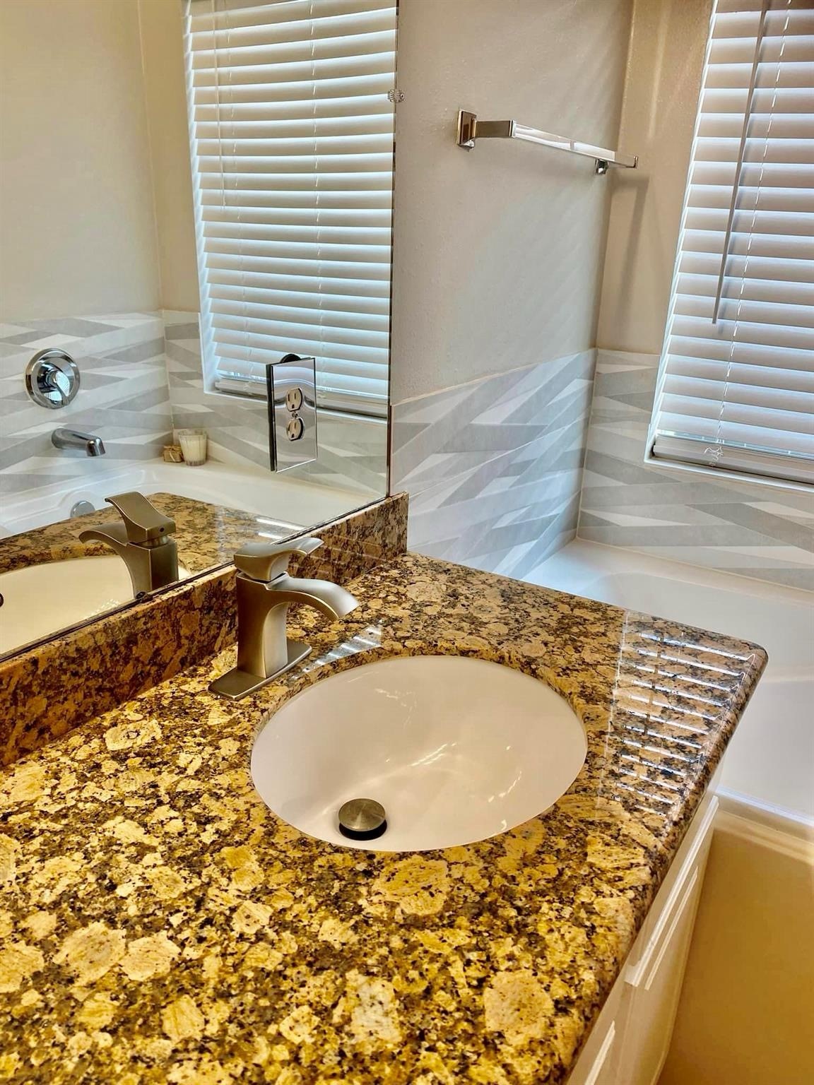 21127 Gate View Drive Houston, TX 77073 - Photo 10 of 18 a bathroom with a sink and a mirror