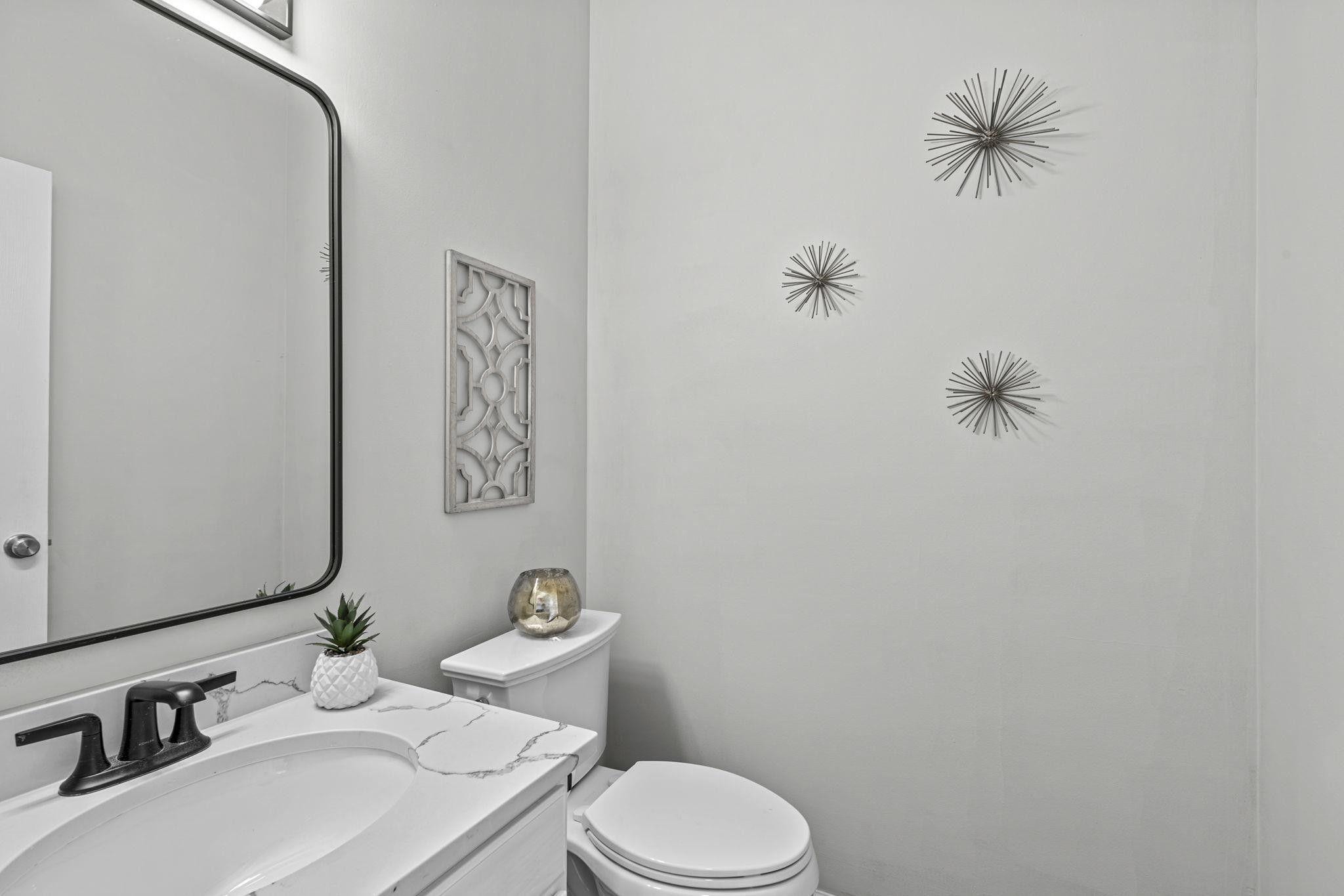 303 Grassy Point Road Apex, NC 27502 - Photo 19 of 36 Main Floor Powder Room