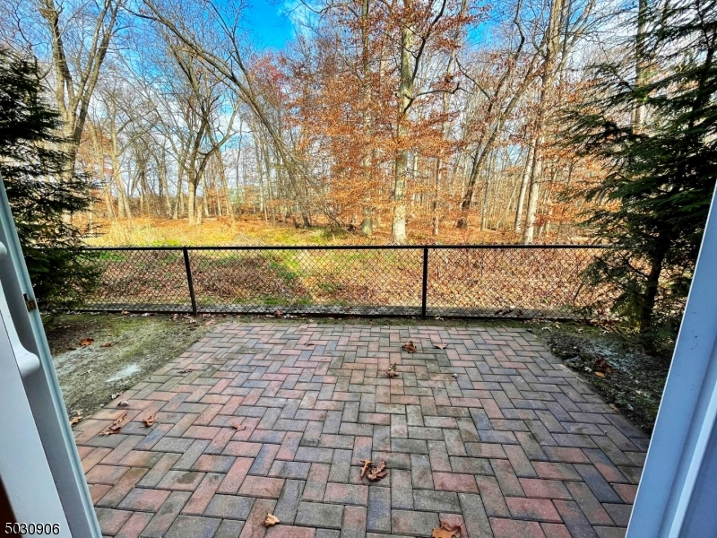 7 North Ridge Circle East Hanover, NJ 07936 - Photo 22 of 25 a view of a yard with wooden fence