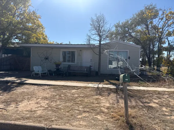 a big house with yard and parking space