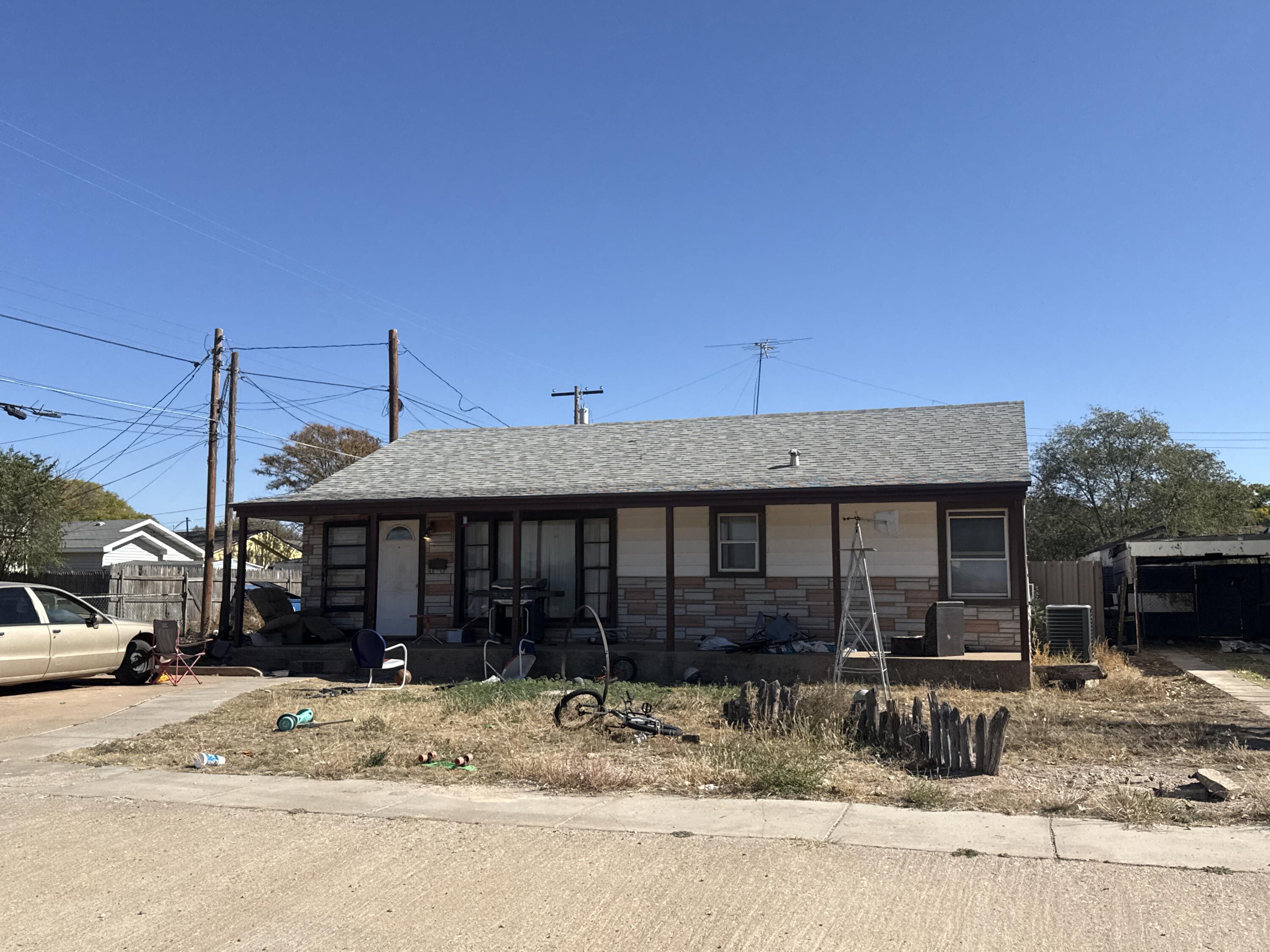 201 Maple Street Levelland, TX 79336 - Photo 10 of 10 a view of a house with a patio