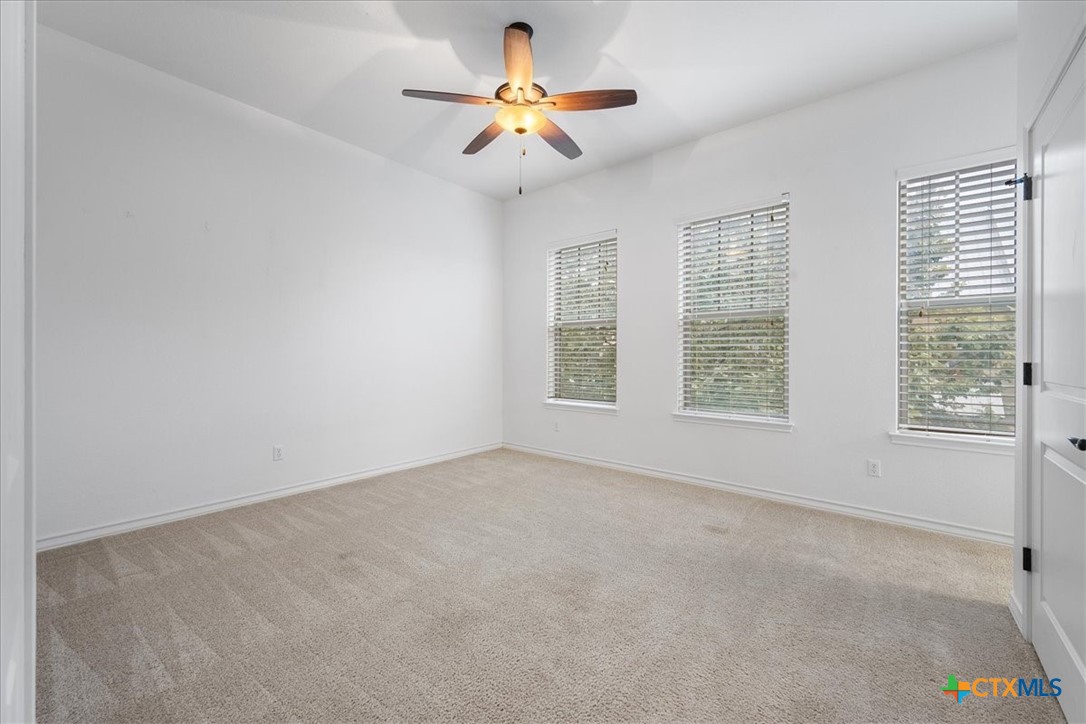 1009 Highknoll Lane Georgetown, TX 78628 - Photo 24 of 38 a view of an empty room with a window