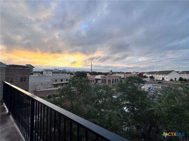 a view of a city from a balcony