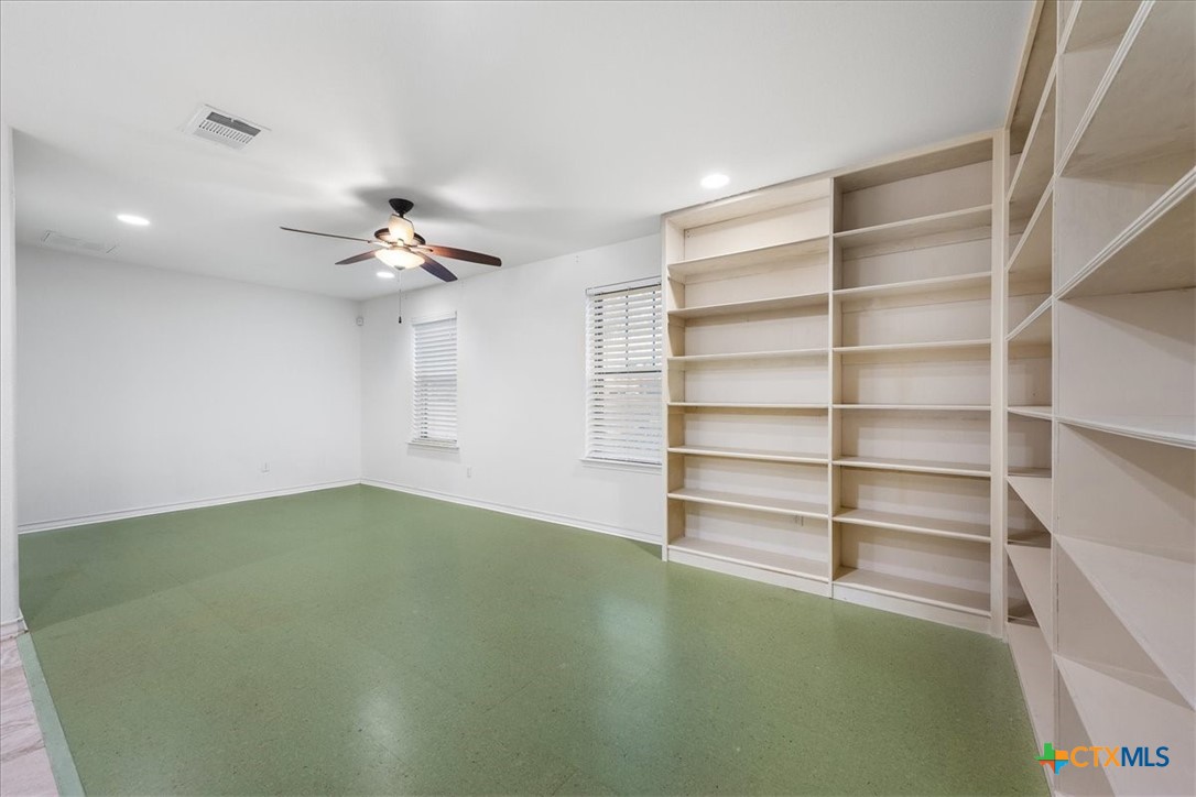 1009 Highknoll Lane Georgetown, TX 78628 - Photo 33 of 38 a view of an empty room with a window