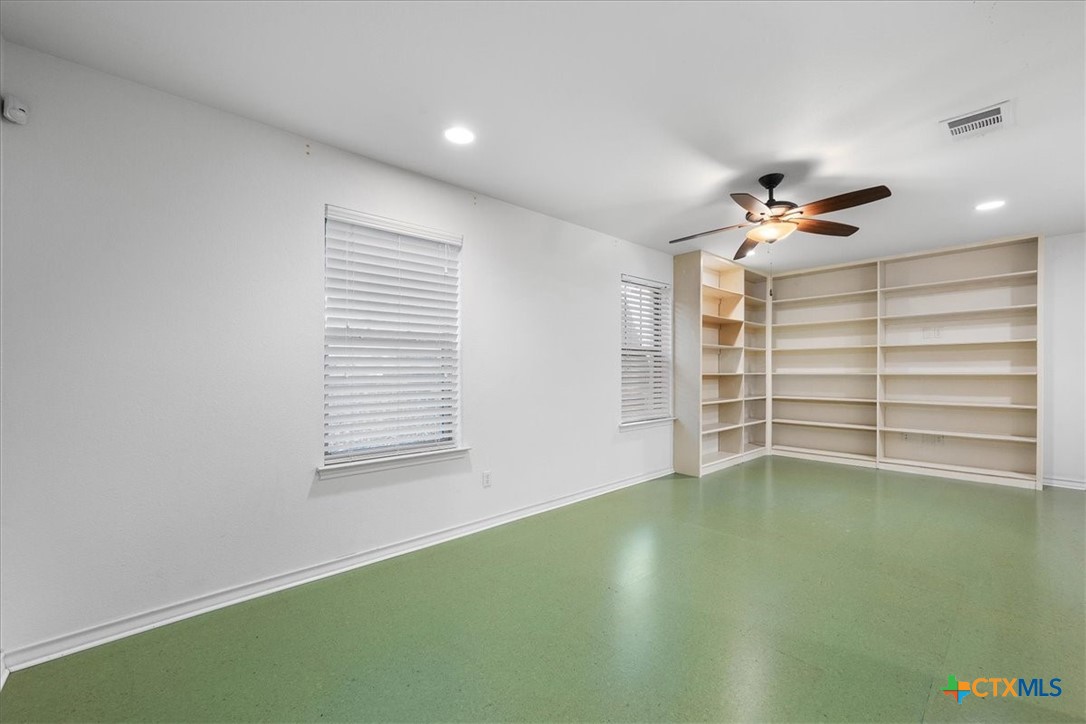 1009 Highknoll Lane Georgetown, TX 78628 - Photo 34 of 38 a view of an empty room with a window