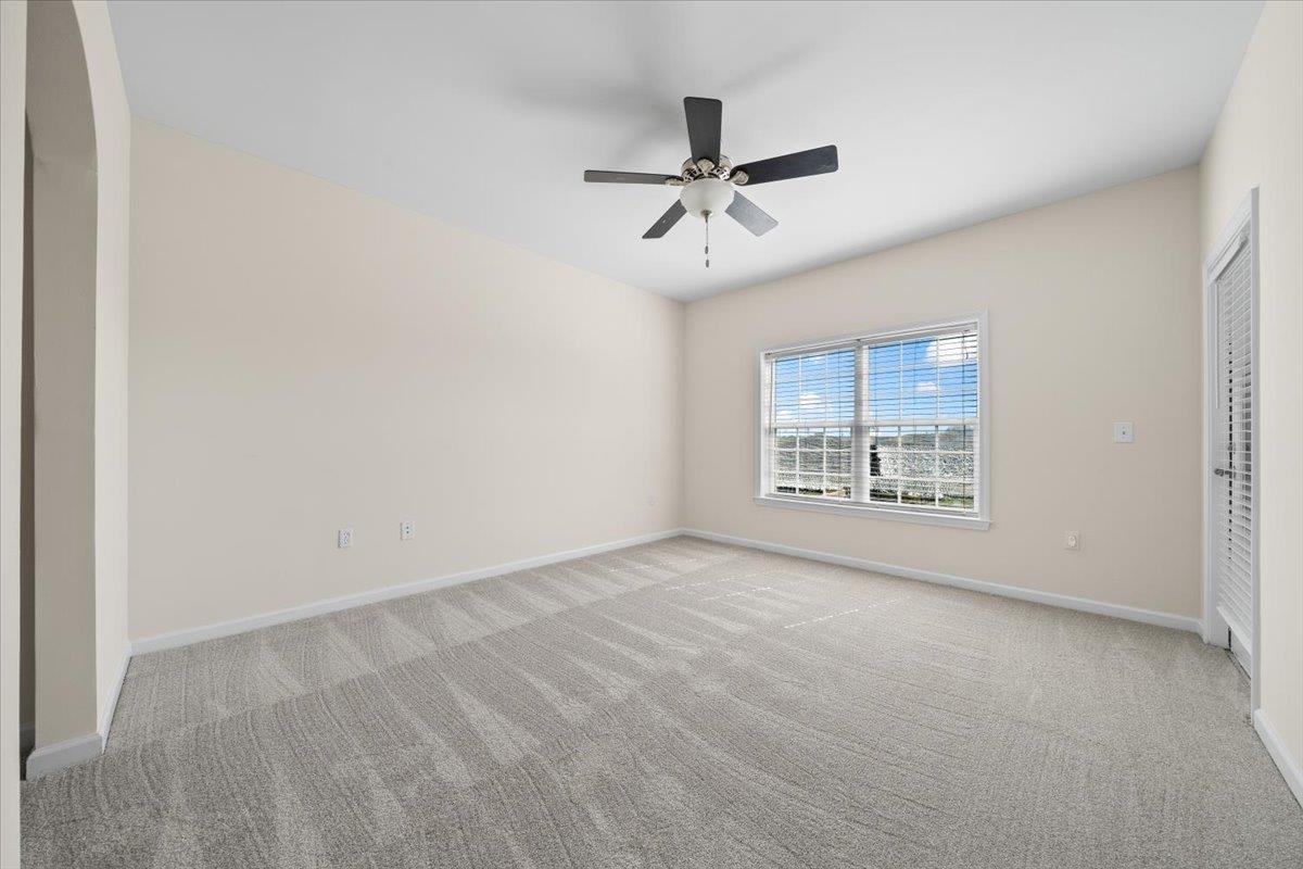 665 Tennessee Street, Unit 411 Memphis, TN 38103 - Photo 14 of 29 an empty room with windows