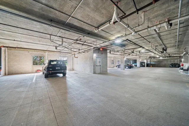 a view of parking garage with furniture