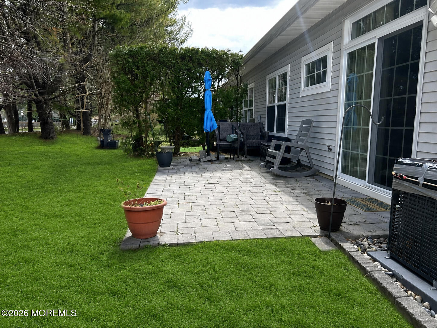 48 Riva Boulevard Brick, NJ 08723 - Photo 3 of 22 48 Riva yard-bad grass