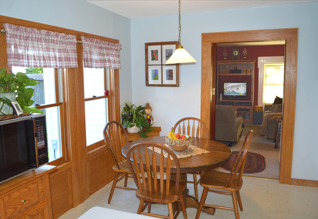 44-w703 Rowe Road Elburn, IL 60119 - Photo 9 of 25 a dining room with furniture and window